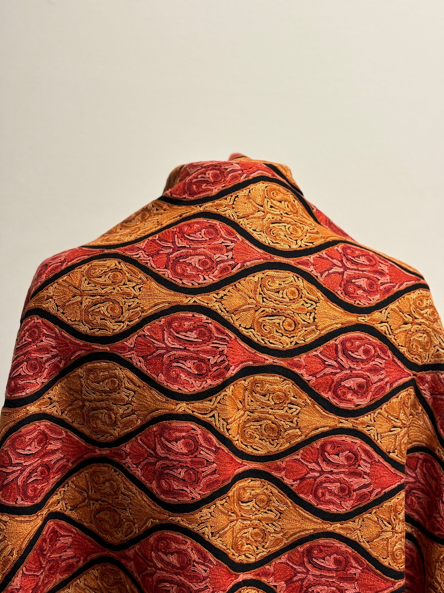 Shawl- Black color Woolen shawl with Red and Yellow Aari embroidery